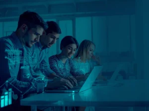Small business team using AI tools on laptops and tablets with digital productivity metrics and workflow optimization.